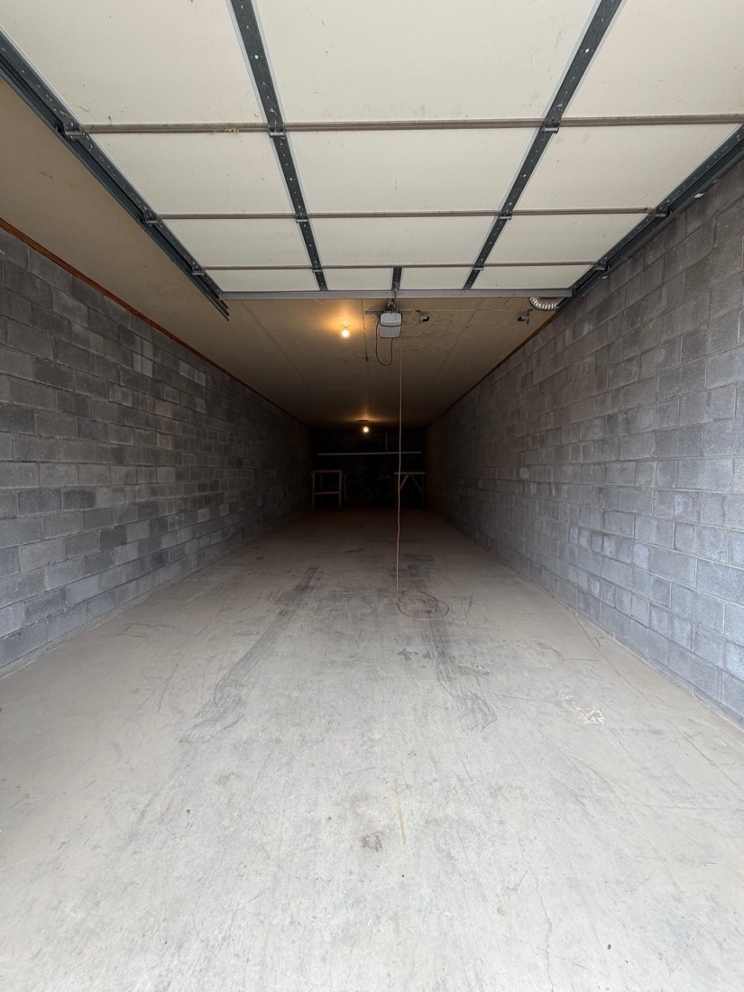 Open 870 sq ft storage bay showing 60 foot depth ideal for boats, RVs, and vehicles